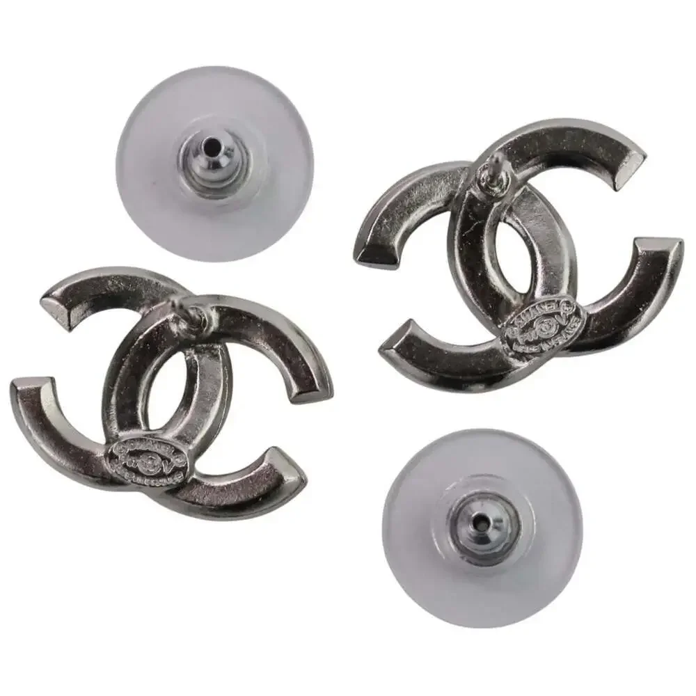 CHANEL Silver Logo Earrings